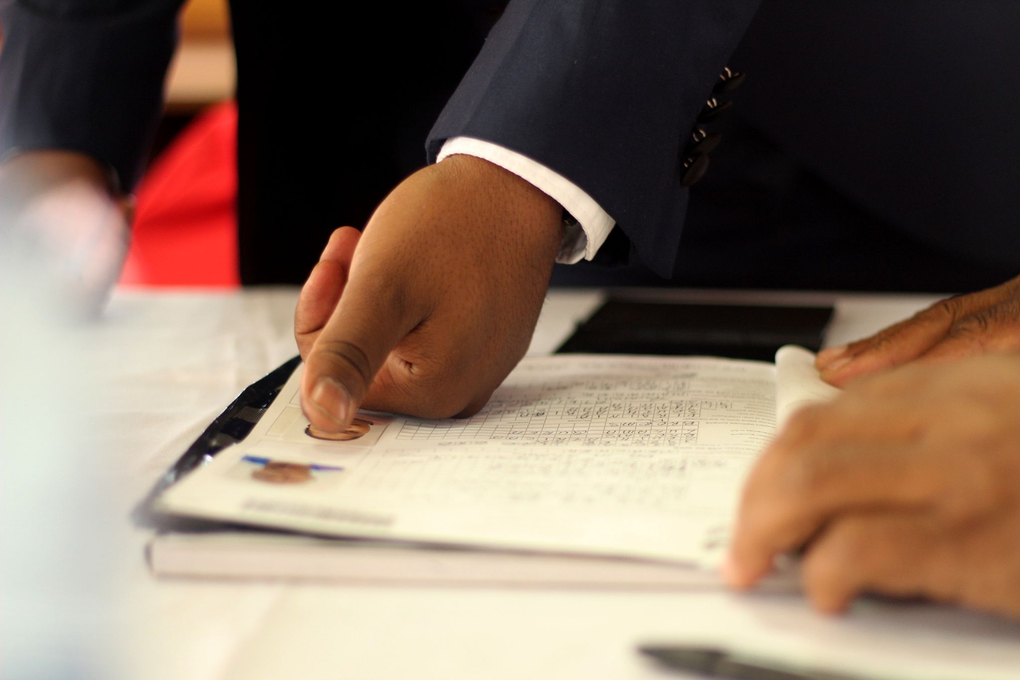 Mobile notary assisting with document authentication during a professional notarization appointment in Arizona