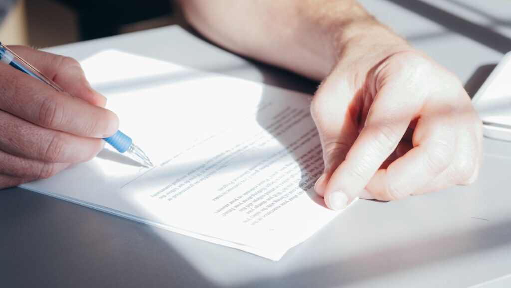 Mobile notary notarizing a document for a client during a professional appointment in Arizona