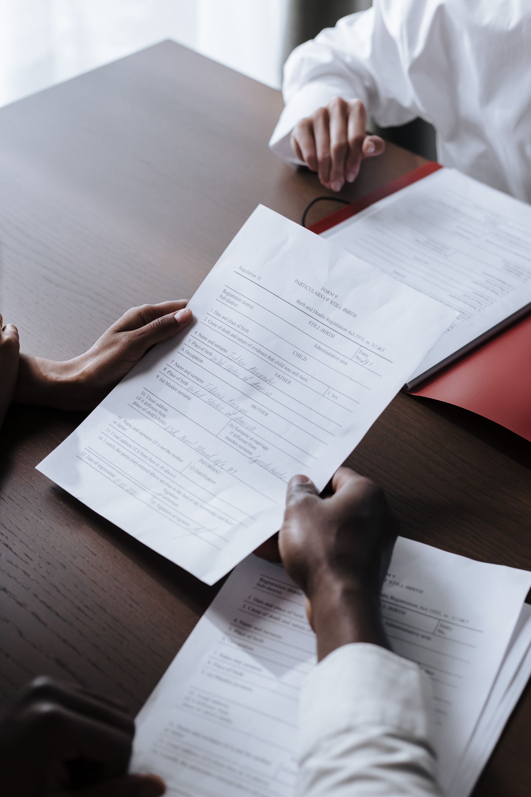 Arizona notary acknowledgment and jurat certificates with a notary stamp, journal, and pen